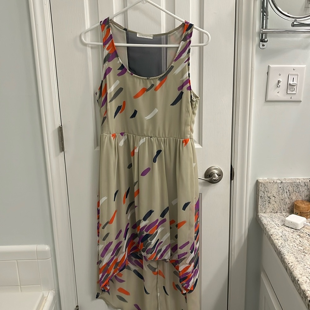 Asymmetrical dress with mesh back